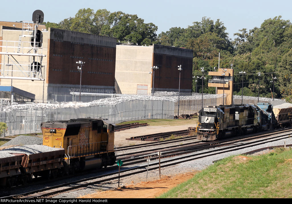 UP 4827 leads a rock train towards train 97Q